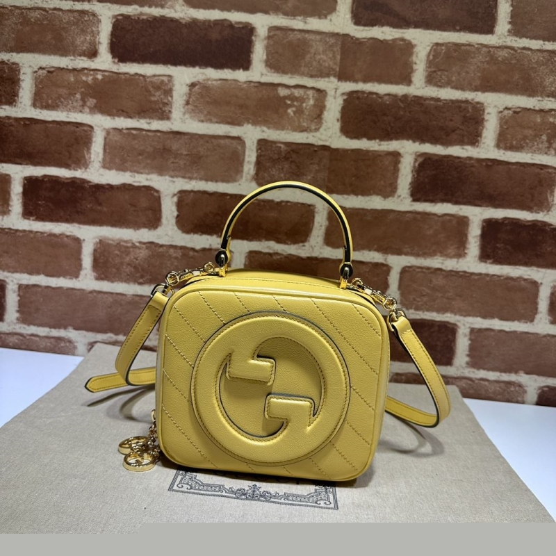 G*u*i top handle bags